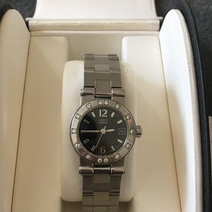 Authentic Movado ladies Vizio Sport diamond bezel watch w/black face and date